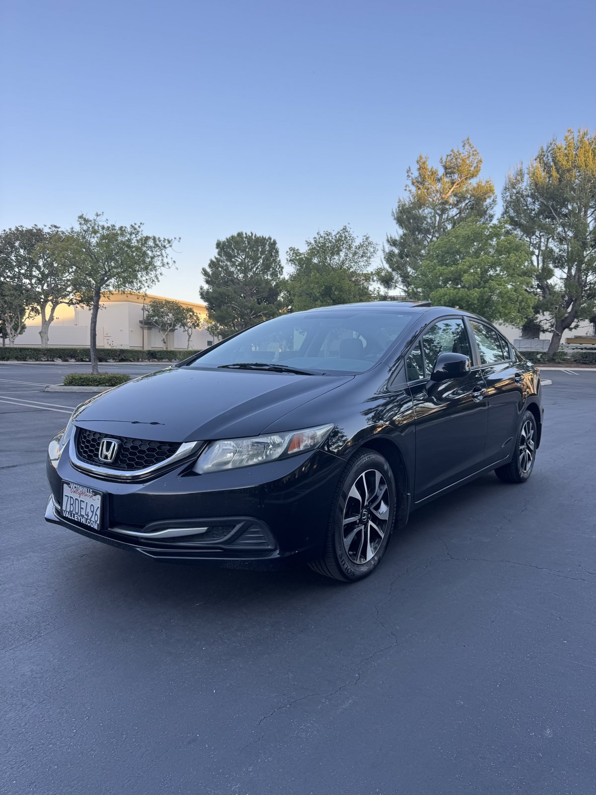 Black 2013 Honda Civic EX front driver-side three-quarter view